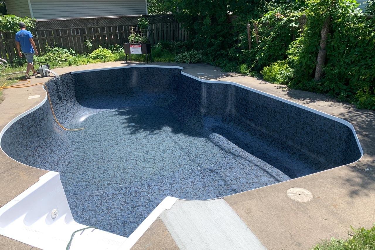 Installation toile sur mesure piscine creusée Installation toile sur mesure piscine creusée